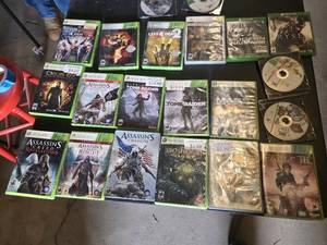 Lot of Xbox 360 Video Games including Assassins Creed Series, Tomb Raider, and Bioshock