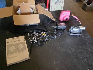 Hitachi DZ-HS303A Hybrid Camcorder with Accessories and Fujifilm Instax Mini 9 Camera