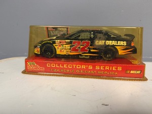 NASCAR RACING CHAMPIONS Ward Burton #22 Cat 124 Die Cast