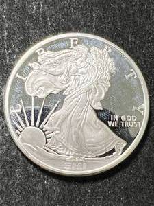 1 TROY OZ .999 FINE SILVER AMERICAN EAGLE DESIGNED ROUND