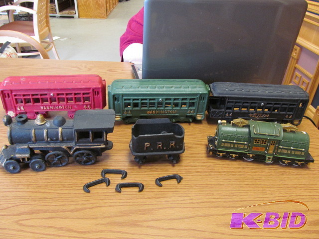 lot 81 image: Reproduction cast iron train  engine plus 3 cars, Avon trolley car, San Francisco Musical Cable Car