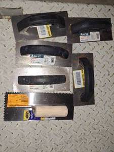 Tile flooring trowels