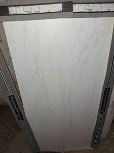 4 boxes 64sqft 24x48 porcelain tile