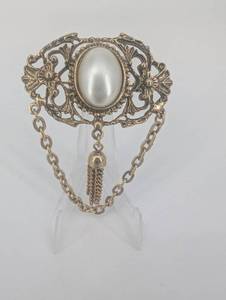 Vintage Gold-Tone Filigree Brooch with Oval Cabochon and Chain Tassels