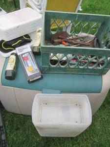 Plastic milk crate containing vinta...