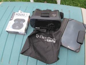 LG tablet, ear buds and reality sty...