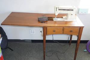Singer Sewing Machine in Cabinet