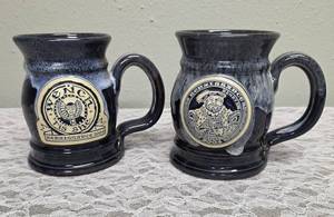Two handmade stoneware mugs commonly sold as souvenirs at Renaissance Festivals.  Produced by Deneen Pottery.&nbsp&nbsp