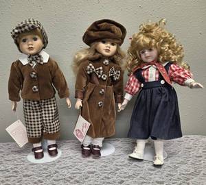Three collectible porcelain dolls.  From the Premier Doll collection.&nbsp&nbsp