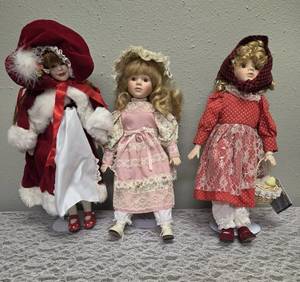 Three collectible porcelain dolls.  From the Premier Doll collection.&nbsp&nbsp