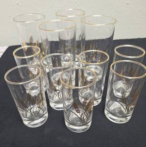 Seven  vintage Homer Laughlin Golden Wheat glasses.   Four vintage Homer Laughlin Golden Wheat tumblers.&nbsp