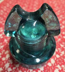 Mickey Mouse glass insulator specifically a CD 257 type manufactured by Hemingray. Were used on power poles to insulate telegraph and telephone wires from the wooden poles holding them.&nbsp;&nbsp;