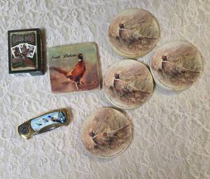 Five - Pheasant themed coaster, One deck of Pheasant Playing cards - unopened. One- Pheasant Pocket Knife.