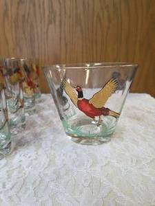 Hazel-Atlas Ice bucket and  8 glasses.   The glasses and Ice Bucket feature a 22K gold aim and detailed red, black and gold pheasant designs.&nbsp&nbsp