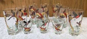 Eight vintage set of Hazel Atlas glassware in the Pheasant pattern, commonly found as part of Mid-Century Modern (MCM) barware sets and 3 shot glasses. Features flying pheasants in red, black and gold colors with 22 k gold rim.&nbsp