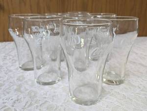 Eight Vintage Coco-Cola glasses.&nbsp