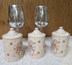 Three LTD 6 Ceramic Canisters and Two Metallic finished wine glasses.  The canisters and the wine glasses both have holiday themes.&nbsp