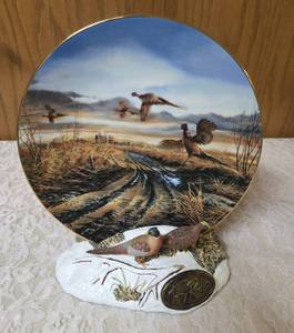 Terry Redland.  Two Terry Redland plate holders  with Two Terry Redland plates. The plates are Country Road and Prairie Skyline.&nbsp