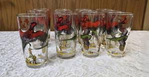 12 -Misc. Glass Sizes.  Glassware is likely produced by the Hazel-Atlas Glass Company and  features the Pheasants pattern, produced roughly 1950s. The glasses feature the yellow hunting dogs and white flying birds.&nbsp