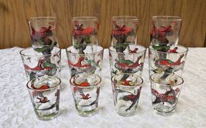 12 -Misc. Glass Sizes.  Glassware is likely produced by the Hazel-Atlas Glass Company and  features the Pheasants pattern, produced roughly 1950s. The glasses feature the yellow hunting dogs and white flying birds.&nbsp