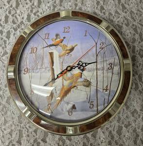 Vintage themed wildlife style wall clock featuring decorative artwork of pheasants.  Clock works has new batteries.&nbsp&nbsp