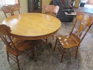 Gorgeous wood round pedestal dining...