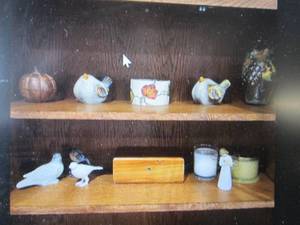 Metal pumpkin jar, 2 glass birds, leaf pillar candle stand, glass grapevine vase, 2 ceramic birds, heavy metal bird, willow tree angel, mini Lane cedar chest from St Paul House of Furniture