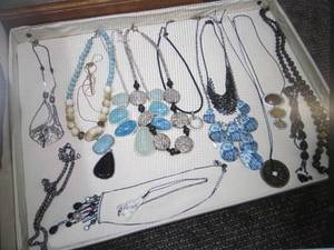 Assortment of necklaces in a cloth tote