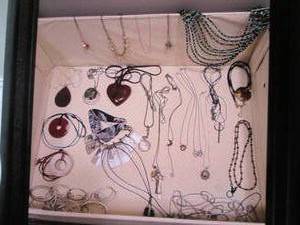 Assortment of necklaces in a cloth tote