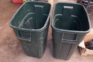2 Rubbermaid Garbage Cans