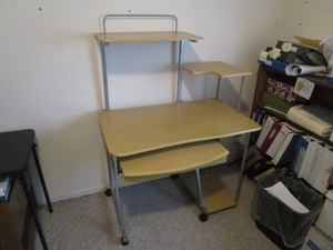 Computer desk (has one broken rear ...