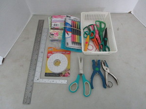 Scrapbook supplies � hole punches,...