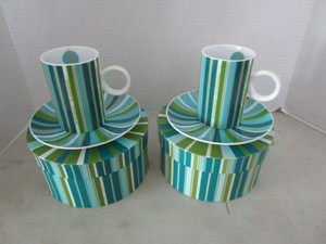 2 Round �hat boxes� with cup and ...