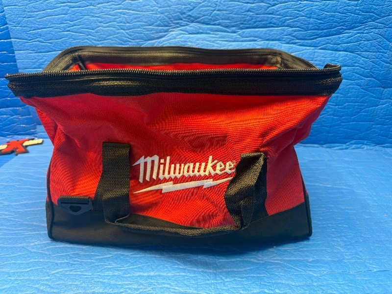 This item is a Milwaukee contractor tool bag, constructed from tough, water-resistant 600 denier material.