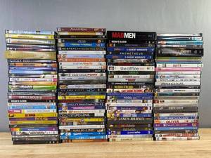 120 DVD Movie Collection - The West Wing, The Office, Oceans Eleven, The Deep End, Knocked Up, Anna and the King, Diary of a Wimpy Kid, Madagascar, The Lion, Witch and the Wardrobe, The Dark Knight, Gremlins 2 The New Batch, Narnia C