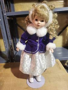 Collectible Blonde Doll in Formal Winter Outfit