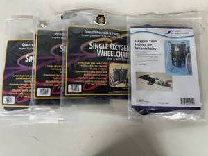 Lot of 4 EZ-ACCESS and SP Ableware Oxygen Tank Holders. Durable nylon sleeves that securely strap oxygen tanks to wheelchairs. Feature reinforced bottoms and adjustable buckles for safety and easy travel. Ideal for clinics and home care.