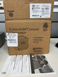 NEW in open box DeVilbiss Pulmo-Aide Compact Compressor Nebulizer (3655D). A machine that turns liquid medicine into a fine mist you can breathe in. Small, portable, and durableperfect for managing asthma or COPD away from home.
