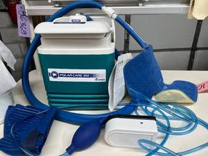Breg Polar Care 300 unit with Multi-Use WrapOn pad and pump. This system circulates ice water to joints for easy pain and swelling relief. Its great for home recovery and stays cold for 6-8 hours. Quiet, portable, and simple to use.