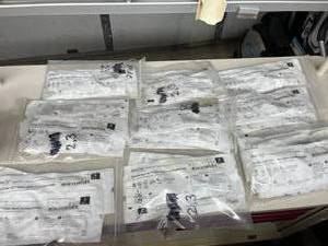 Bulk lot of SunOne GreenLineD Fiber Optic Macintosh laryngoscope Blades. Medical tools used to help insert breathing tubes safely. Features bright fiber optic light, sterile single-use design. Ideal for emergency kits and medical training.