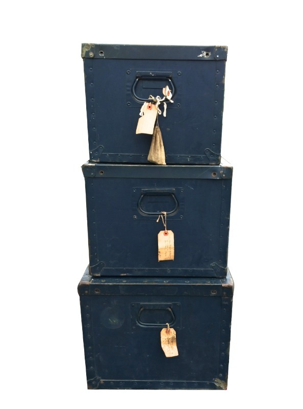 lot 23 image: WWII Era Medium Footlocker. Original baggage tags attached to one handle.
