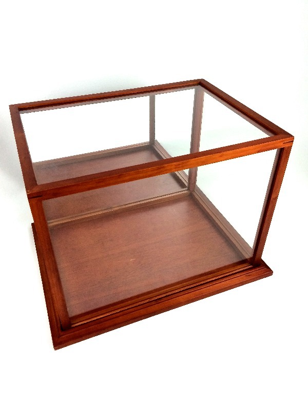 lot 15 image: Varnished Wood & Glass Display Case with a Mirrored Back Panel.  Stands 13 Tall Base approximately 14 x 18