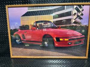 Framed Art Print - Convertible Car in Modern Building Scene