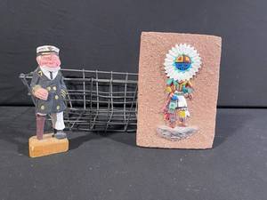 Three-Piece Display Lot Figurine in Wire Basket & Native American Headdress Brick Plaque and Carved Wooden Capatin