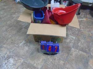 Box of pans & funnels. As shown. CASH ON SITE ONLY. PICKUP IS MONDAY MAY 4TH FROM 11 AM TO 4 PM. REGARDLESS WHAT THE SCHEDULE STATES.