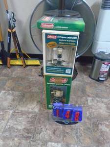 Qty of 2 Coleman lanterns with hangers. As shown. CASH ON SITE ONLY. PICKUP IS MONDAY MAY 4TH FROM 11 AM TO 4 PM. REGARDLESS WHAT THE SCHEDULE STATES.