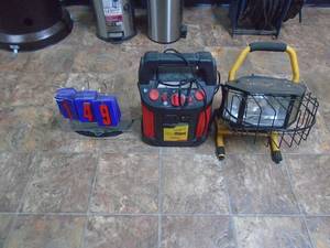 Jump pack with charger & worklight. As shown. CASH ON SITE ONLY. PICKUP IS MONDAY MAY 4TH FROM 11 AM TO 4 PM. REGARDLESS WHAT THE SCHEDULE STATES.