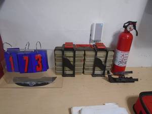 Storage organizer with fire extinguisher. As shown. CASH ON SITE ONLY. PICKUP IS MONDAY MAY 4TH FROM 11 AM TO 4 PM. REGARDLESS WHAT THE SCHEDULE STATES.