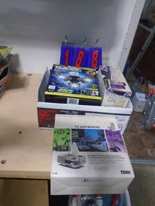 Security light & tv anywhere box. As shown. CASH ON SITE ONLY. PICKUP IS MONDAY MAY 4TH FROM 11 AM TO 4 PM. REGARDLESS WHAT THE SCHEDULE STATES.