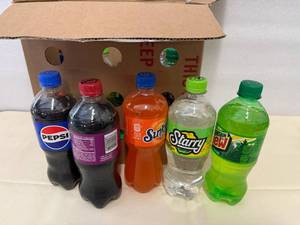 Variety of 20oz Bottles of Pop